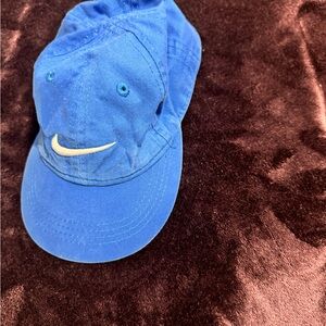 Blue Nike Cap with White Swoosh
